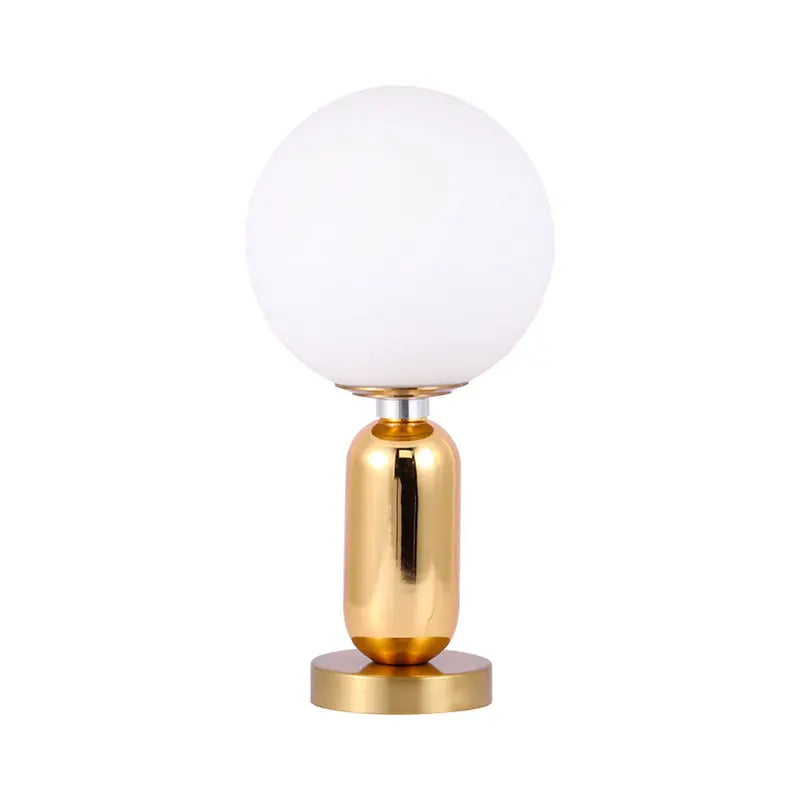 LumiSphère - Lampe Sphérique en Verre avec Socle en Métal Doré - Rynova