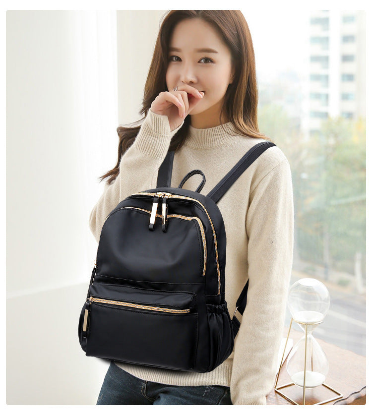 Soleil Chic - Sac à dos étanche en Oxford pour femmes, noir - Rynova